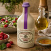 Pommery frambozenazijn witte alcoholazijn Framboise keramische fles in keuken setting met frambozen en salade